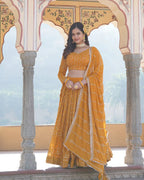 YELLOW COLOR GEORGETTE HEAVY EMBROIDERY THREADED SEMI STITCHED LEHENGA CHOLI