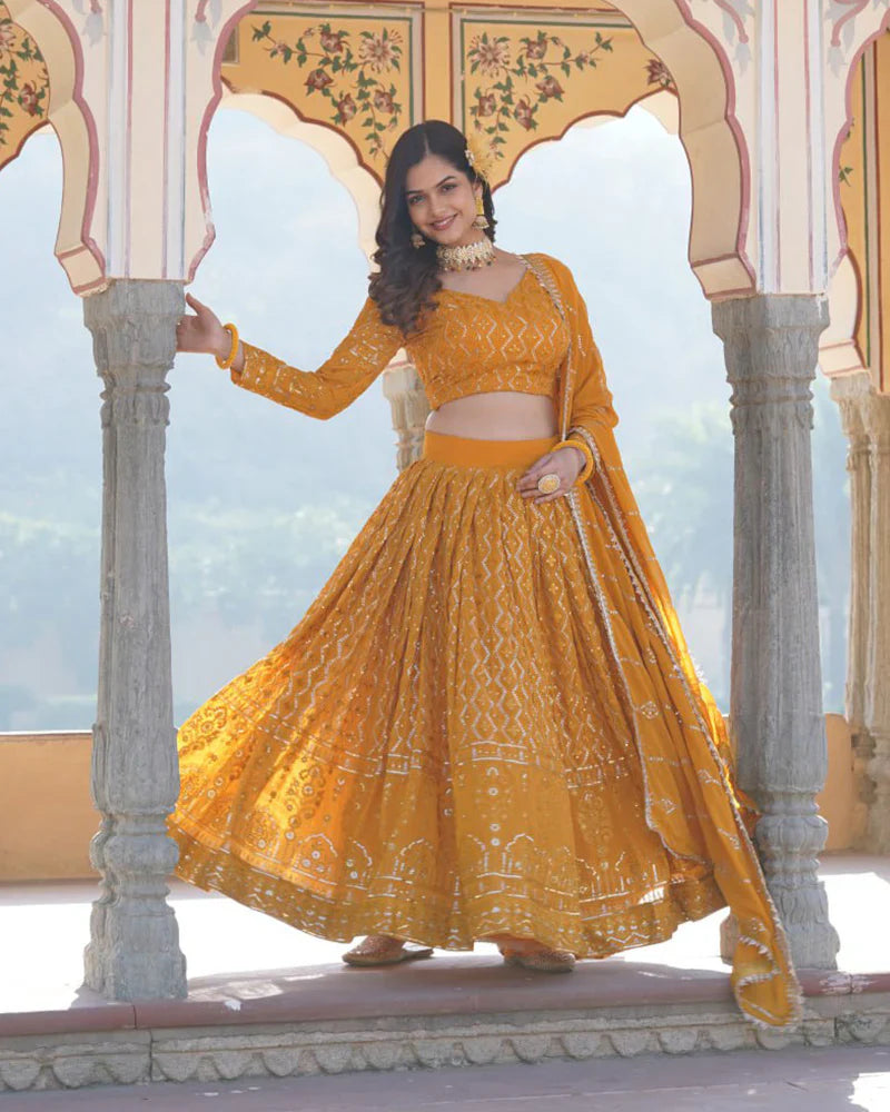 YELLOW COLOR GEORGETTE HEAVY EMBROIDERY THREADED SEMI STITCHED LEHENGA CHOLI