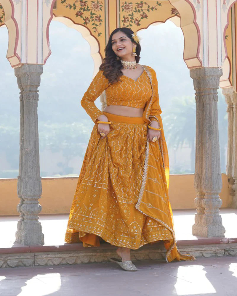 YELLOW COLOR GEORGETTE HEAVY EMBROIDERY THREADED SEMI STITCHED LEHENGA CHOLI