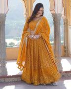 YELLOW COLOR GEORGETTE HEAVY EMBROIDERY THREADED SEMI STITCHED LEHENGA CHOLI