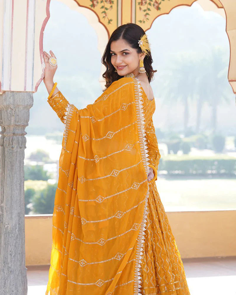 YELLOW COLOR GEORGETTE HEAVY EMBROIDERY THREADED SEMI STITCHED LEHENGA CHOLI