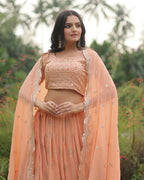 PEACH COLOR SOFT GEORGETTE DESIGNING LEHENGA CHOLI