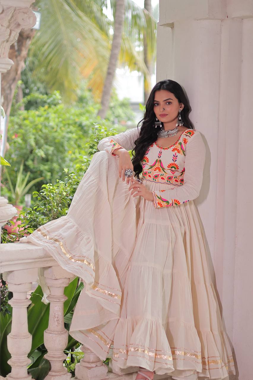 OFF WHITE COLOR KORA COTTON EMBROIDERED FLARED NAVRATRI GOWN