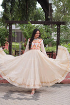 OFF WHITE COLOR KORA COTTON EMBROIDERED FLARED NAVRATRI GOWN