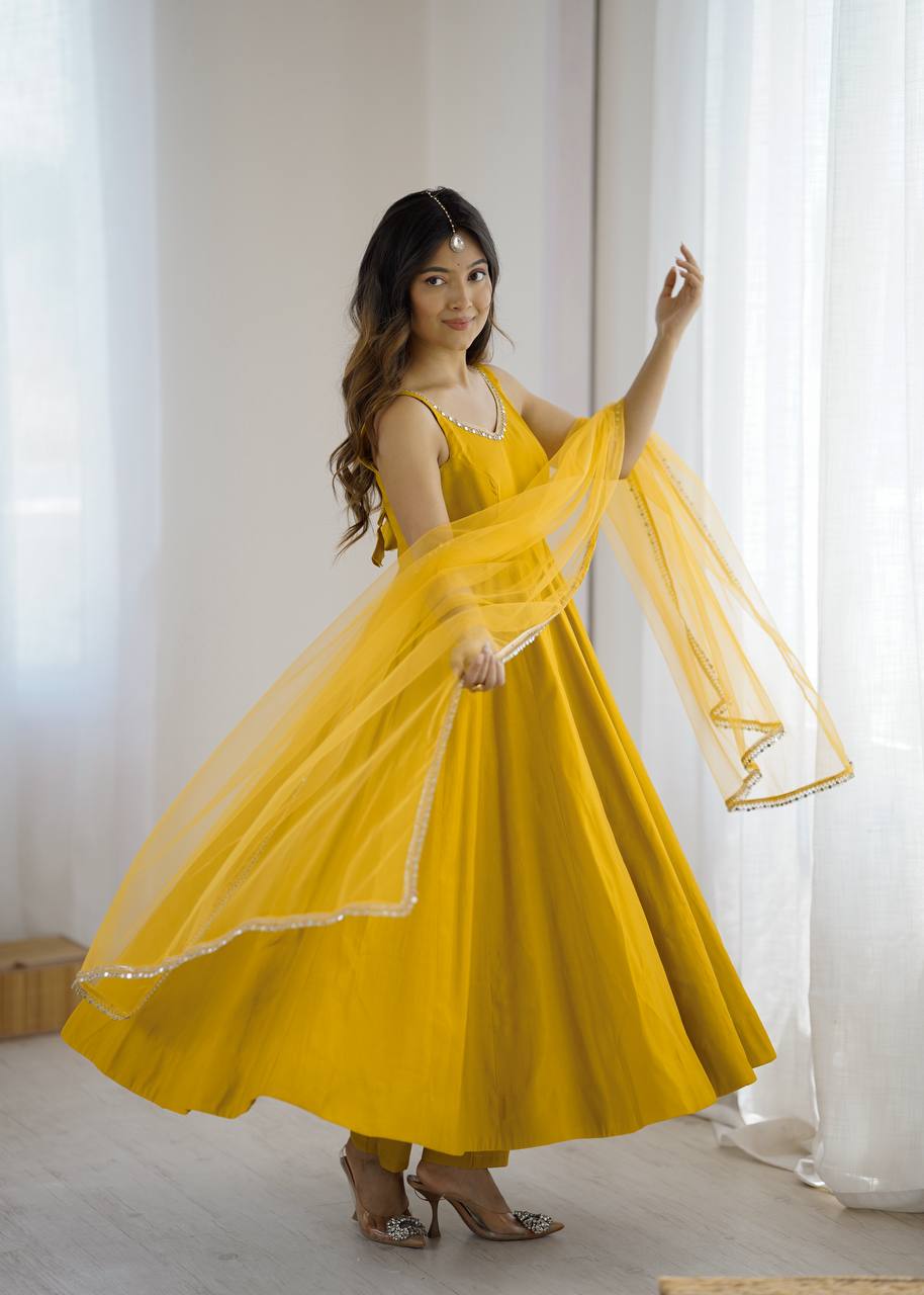 YELLOW COLOR PURE ROMANSILK CHANDERI FABRIC BASE FULLY FLAIR ANARKALI SUIT SET OF 3