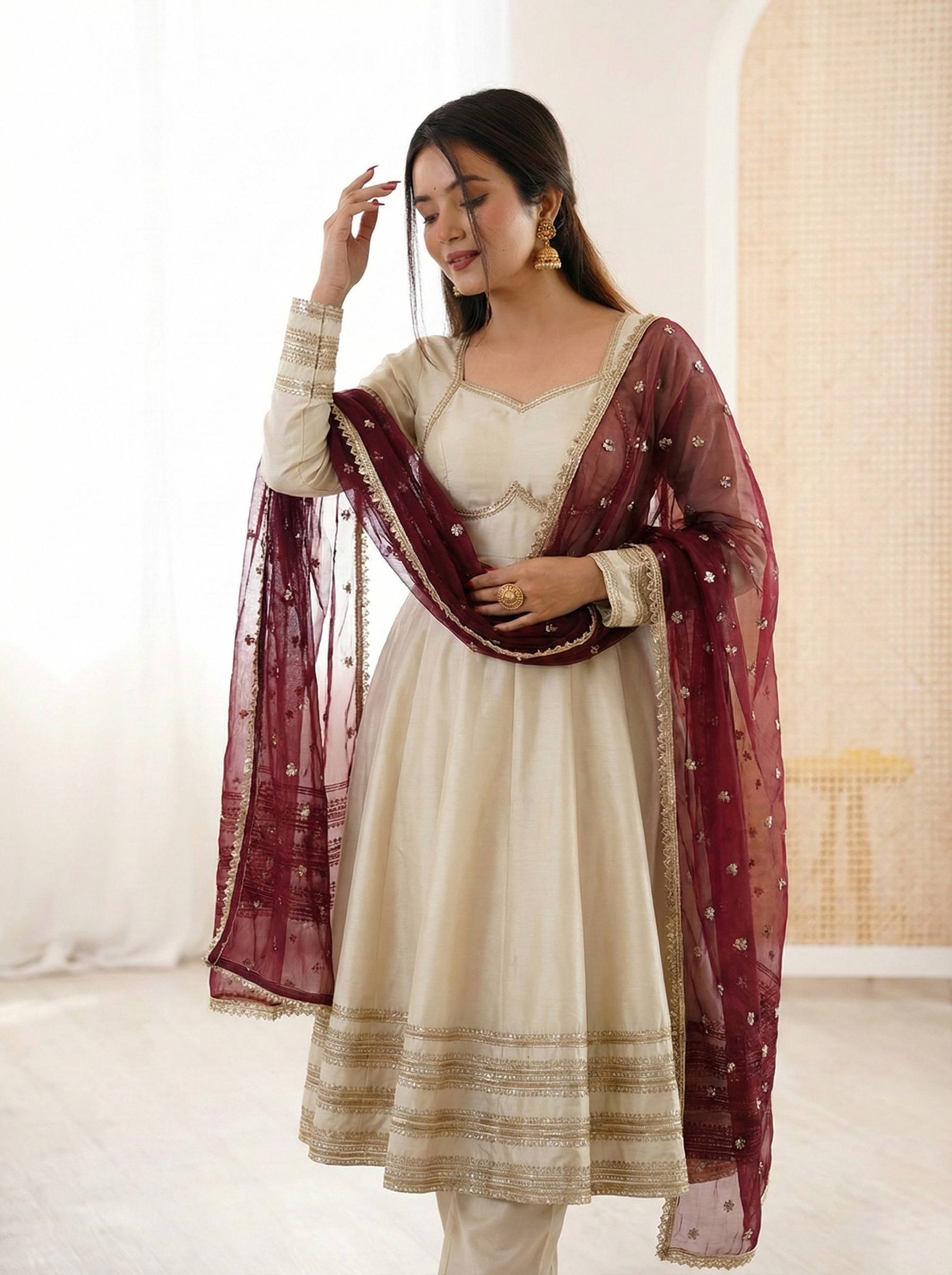 BEIGE COLOR PARTY WEAR COSMOS GOLD EMBROIDERED ANARKALI SET