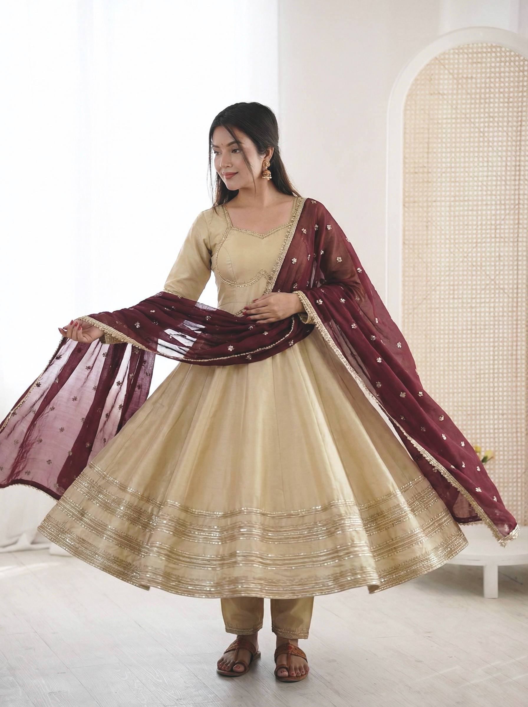 BEIGE COLOR PARTY WEAR COSMOS GOLD EMBROIDERED ANARKALI SET