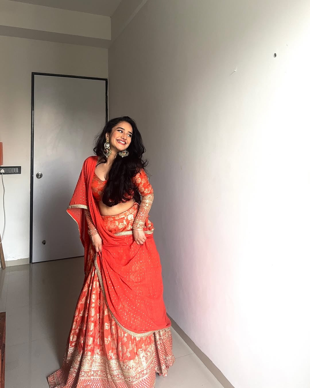 ORANGE COLOR PURE VISCOS BANARASI SILK WITH HEAVY THREAD AND SEQUENCE WORK LEHENGA CHOLI