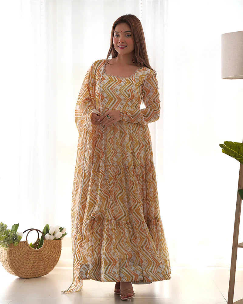 OFF-WHITE COLOR SOFT GEORGETTE THREE LAYER RUFFLE STYLE ANARKALI SUIT