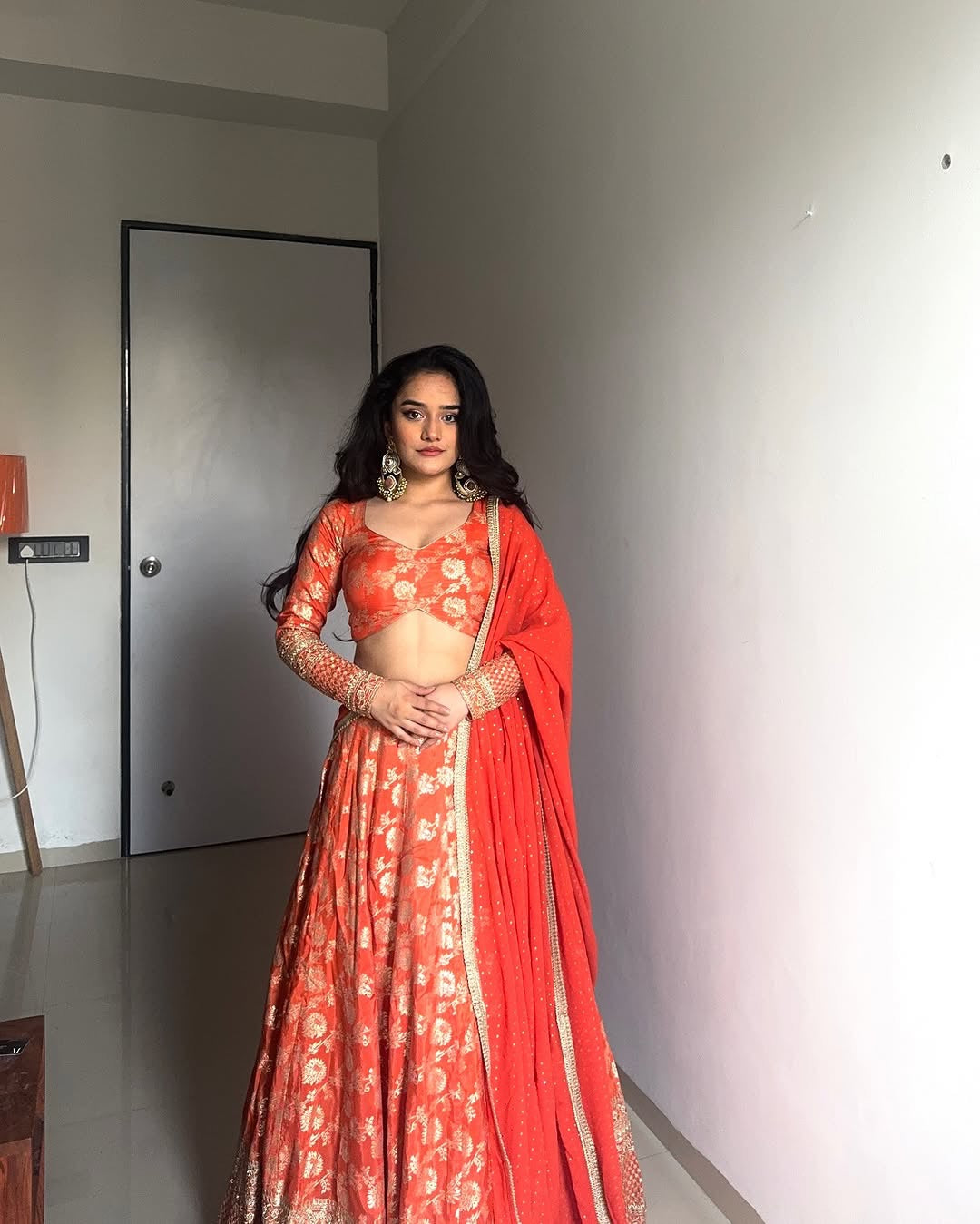 ORANGE COLOR PURE VISCOS BANARASI SILK WITH HEAVY THREAD AND SEQUENCE WORK LEHENGA CHOLI