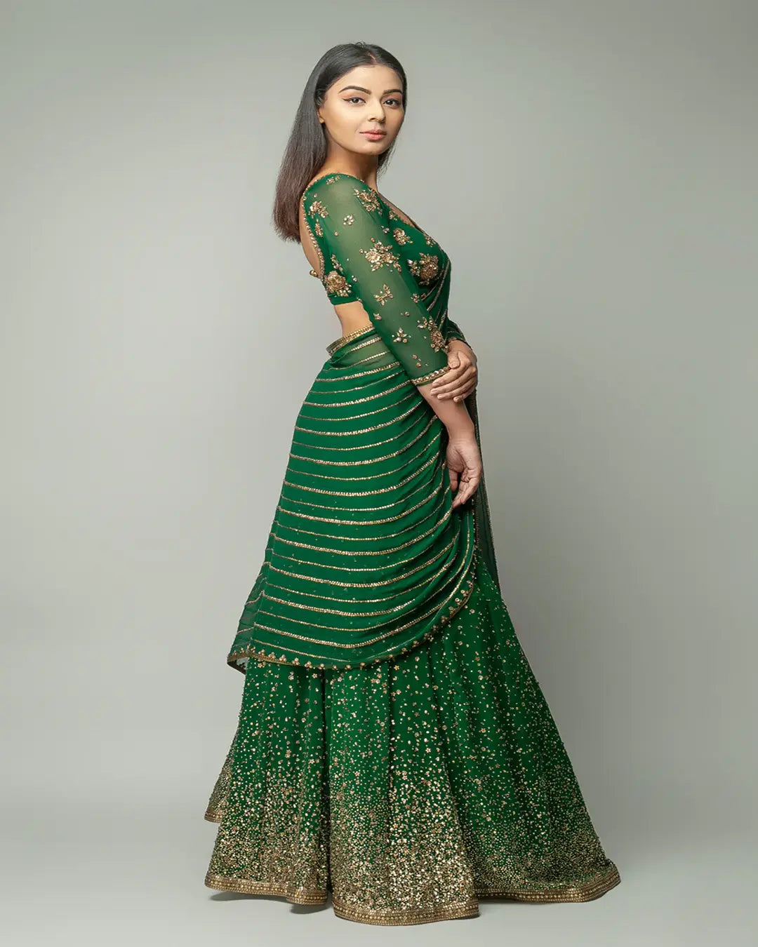 CLASSIC GREEN GEORGETTE BASE STONE AND SEQUENCE WORK LEHENGA CHOLI