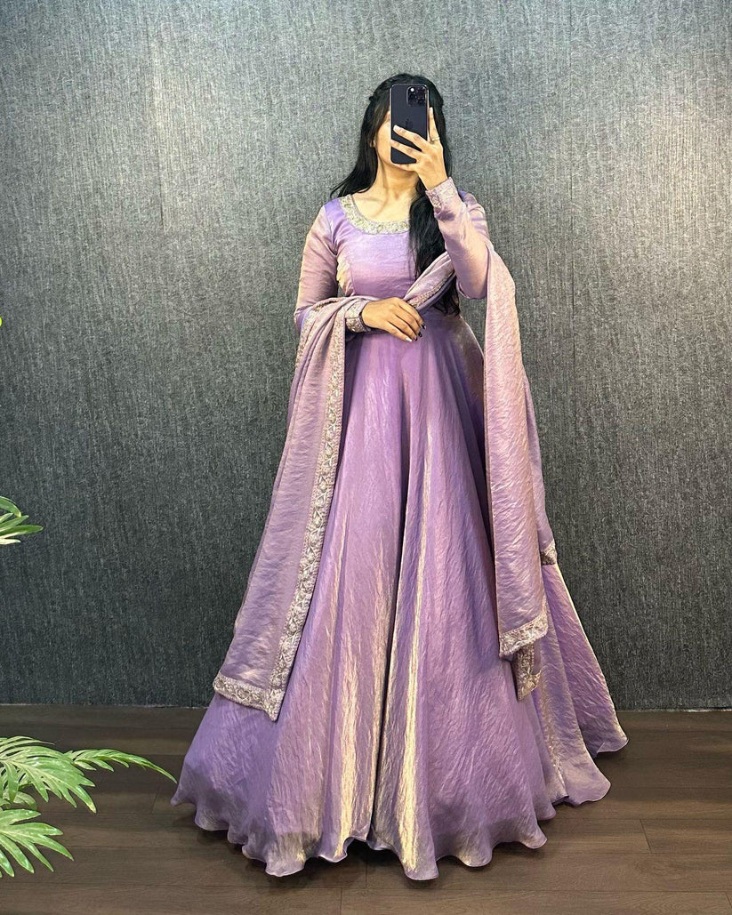 PURPLE COLOR HEAVY FANDY SILK WITH EMBROIDERY SEQUENCE WORK