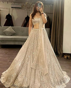 EXUDE ELEGANCE IN EXCLUSIVE WHITE NET LEHENGA CHOLI