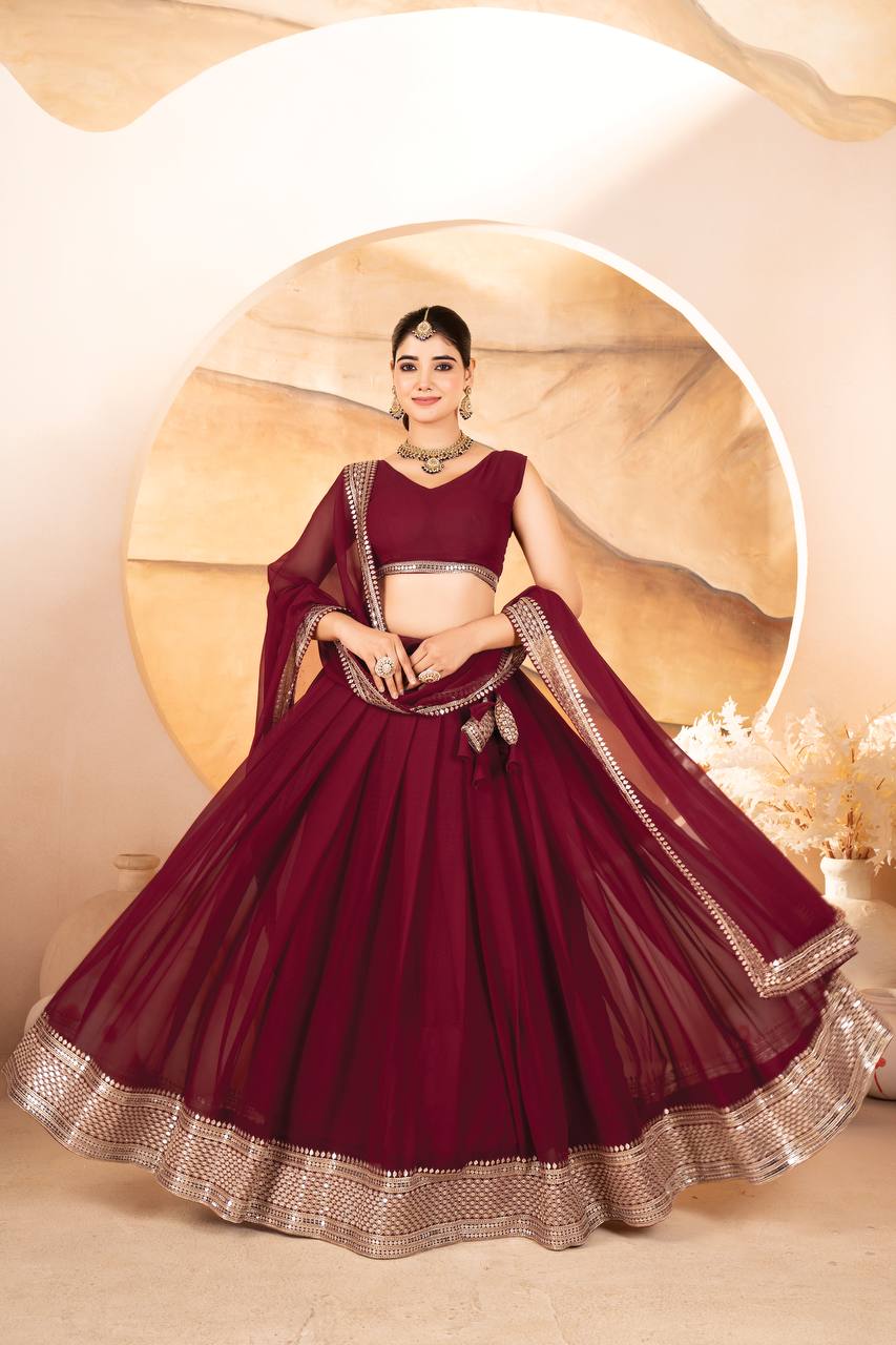 MAROON COLOR SEQUNCE ZARI EMBROIDERED GEORGETTE ATTRACTIVE BORDER LEHENGA CHOLI WITH DUPATTA