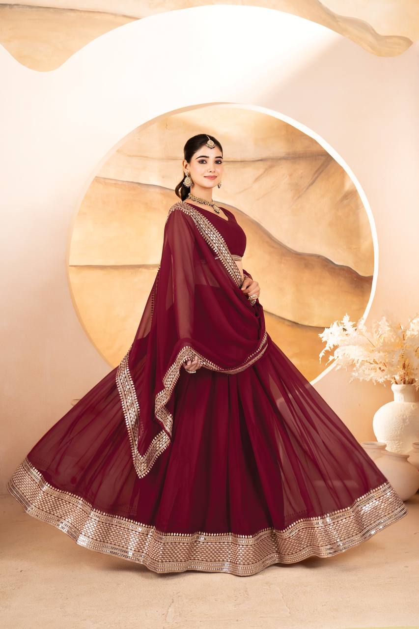 MAROON COLOR SEQUNCE ZARI EMBROIDERED GEORGETTE ATTRACTIVE BORDER LEHENGA CHOLI WITH DUPATTA