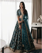 DARK GREEN COLOR PURE VELVET BRIDAL WEAR EMBROIDERED LEHENGA CHOLI