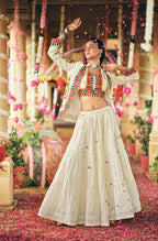 WHITE COLOR RUFFLE STYLE LEHENGA WITH KUTCHI WORK BLOUSE FULLY STITCHED